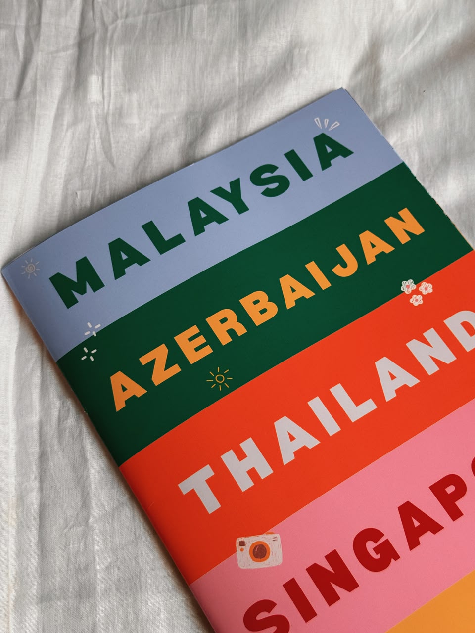 Personalized Travel Book by ORSTAT with colorful destination cover